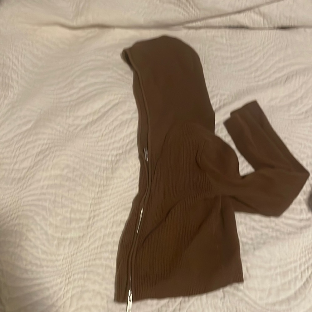 Im selling a cropped Brandy Melville brown rip up, has been worn once.